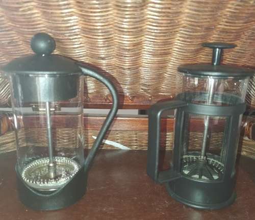 TWO IN PERFACT CONDITION COFFEE PLUNGES SOLD AS IS