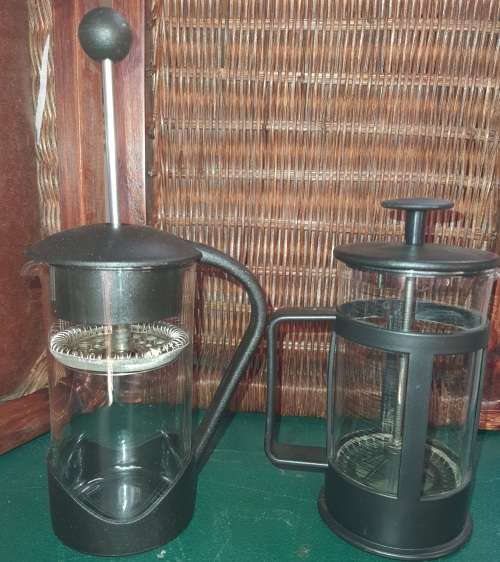 TWO IN PERFACT CONDITION COFFEE PLUNGES SOLD AS IS