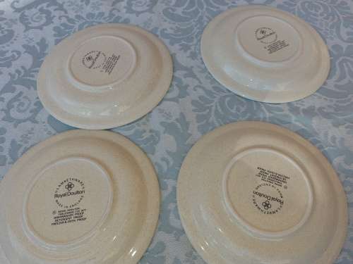 A SET OF FOUR LAMBERTHWARE  ROYAL DOULTON SIDE PLATES