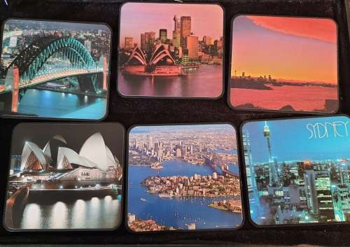 A SET OF 6 SYDNEY AUSTRALIA COLLECTORS COASTERS IN GOOD CONDITION SOLD AS IS