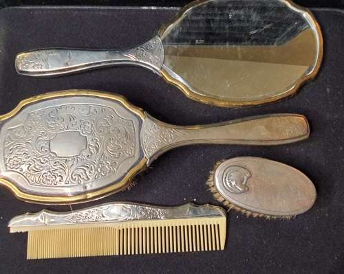 AN ANTIQUE VANITY SET IN ITS ORIGINAL STATE SOLD AS IS