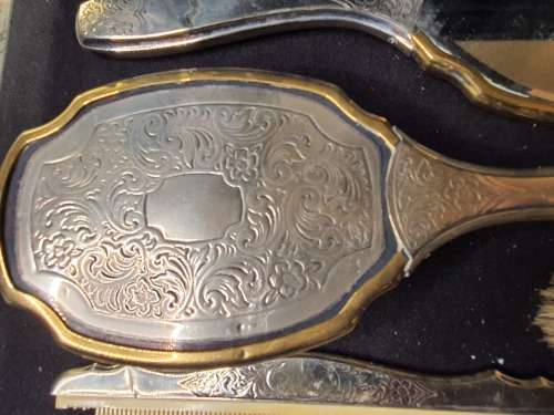 AN ANTIQUE VANITY SET IN ITS ORIGINAL STATE SOLD AS IS