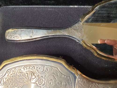 AN ANTIQUE VANITY SET IN ITS ORIGINAL STATE SOLD AS IS
