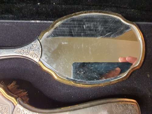 AN ANTIQUE VANITY SET IN ITS ORIGINAL STATE SOLD AS IS