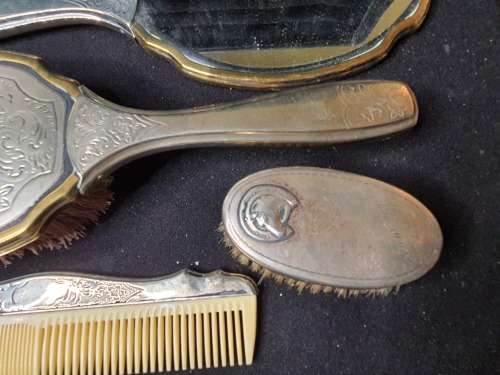 AN ANTIQUE VANITY SET IN ITS ORIGINAL STATE SOLD AS IS