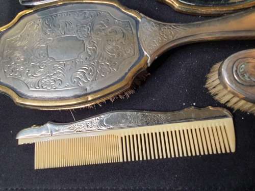 AN ANTIQUE VANITY SET IN ITS ORIGINAL STATE SOLD AS IS