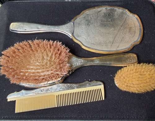 AN ANTIQUE VANITY SET IN ITS ORIGINAL STATE SOLD AS IS