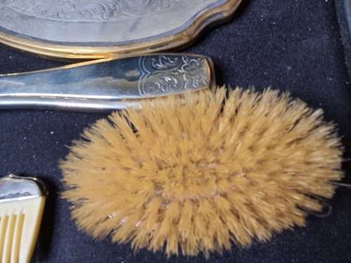 AN ANTIQUE VANITY SET IN ITS ORIGINAL STATE SOLD AS IS