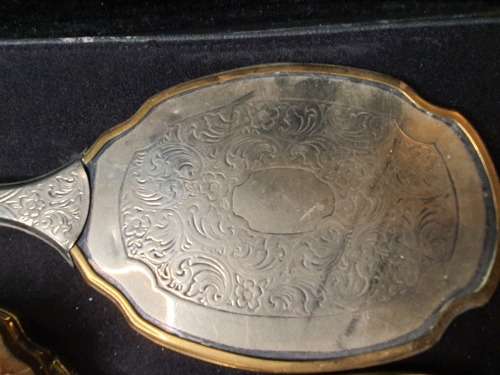 AN ANTIQUE VANITY SET IN ITS ORIGINAL STATE SOLD AS IS