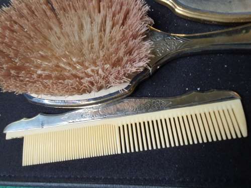 AN ANTIQUE VANITY SET IN ITS ORIGINAL STATE SOLD AS IS