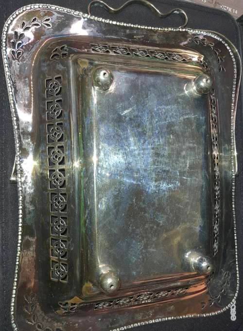 AN ANTIQUE SILVER PLATED BASKET SERVING TRAY IN GOOD CONDITION SOLD AS IS