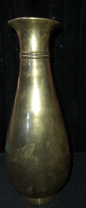 A VINTAGE BRASS VASE SOLD AS IS