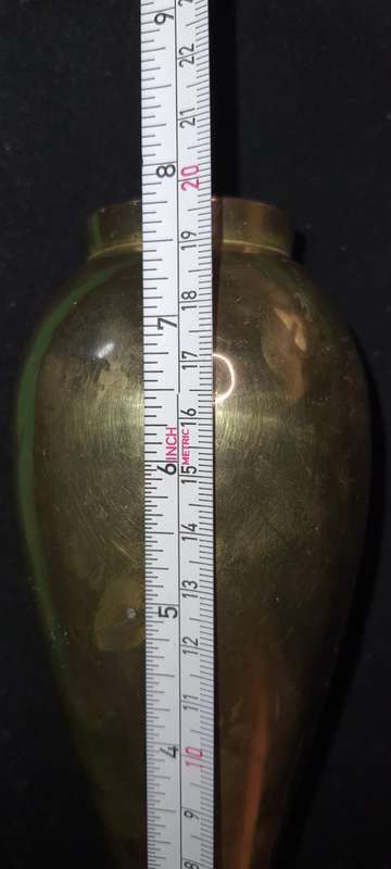 A VINTAGE BRASS VASE SOLD AS IS