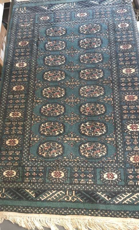 A beautiful hand made Persian carpet with the certificate on it sold as is