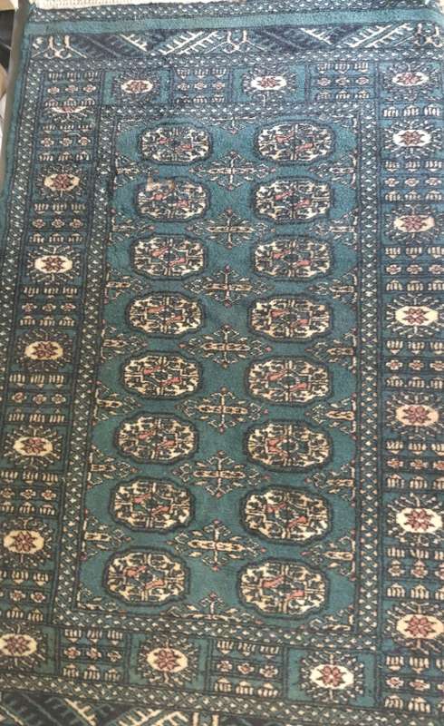 A beautiful hand made Persian carpet with the certificate on it sold as is