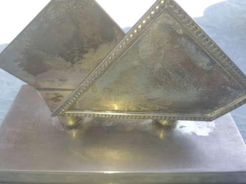 A VINTAGE STAINLESS STEEL SERVIETTE HOLDER