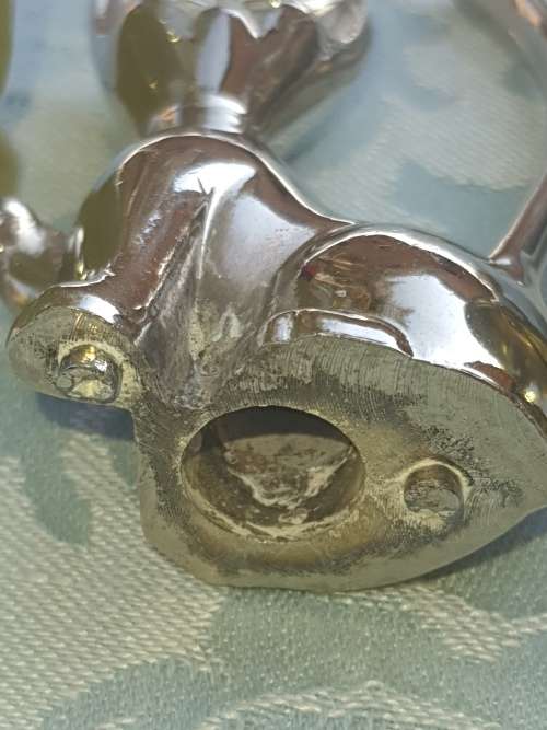 A COLLECTION OF FIGURINES JADE AND SILVER-PLATED BELL AND A BULOVA WATCH SOLD AS IS