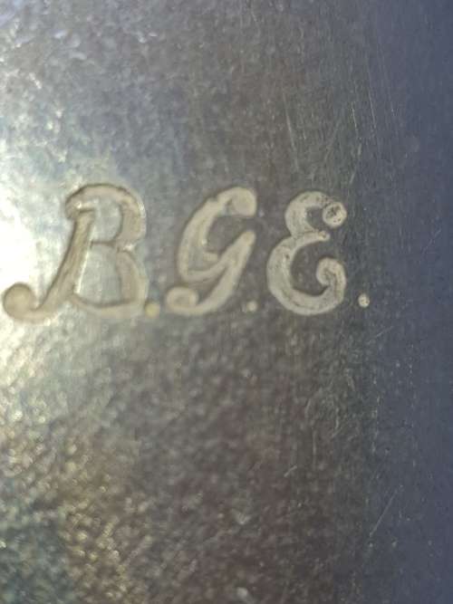 AN ANTIQUE PUTAL BEER MUG MADE IN ENGLAND AND ENGRAVED SOLD AS IS