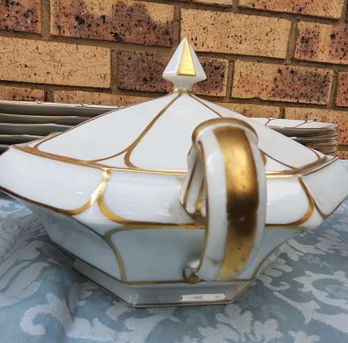 A COMPLETE BAVARIAN DINNER SET WITH GOLD TRIM IN GREAT CONDITION,