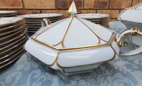 A COMPLETE BAVARIAN DINNER SET WITH GOLD TRIM IN GREAT CONDITION,