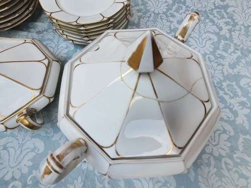 A COMPLETE BAVARIAN DINNER SET WITH GOLD TRIM IN GREAT CONDITION,