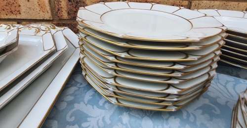 A COMPLETE BAVARIAN DINNER SET WITH GOLD TRIM IN GREAT CONDITION,