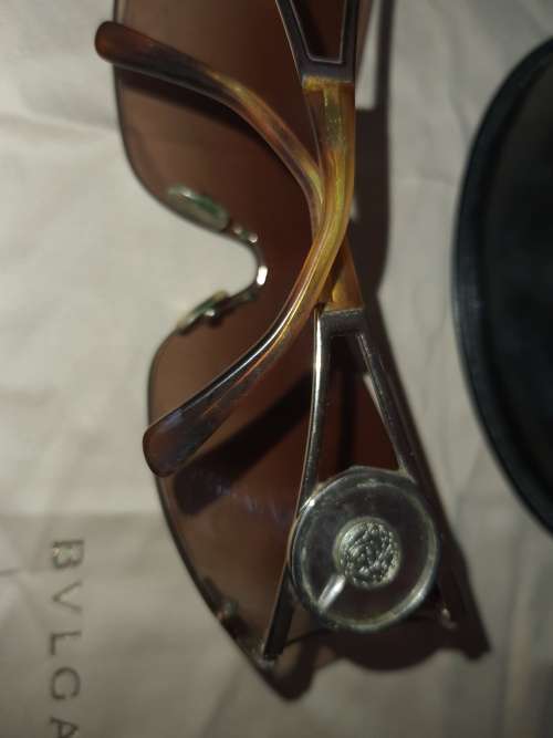 A RARE VINTAGE WOMANS BVLGARI SUNGLASSES SOLD AS IS