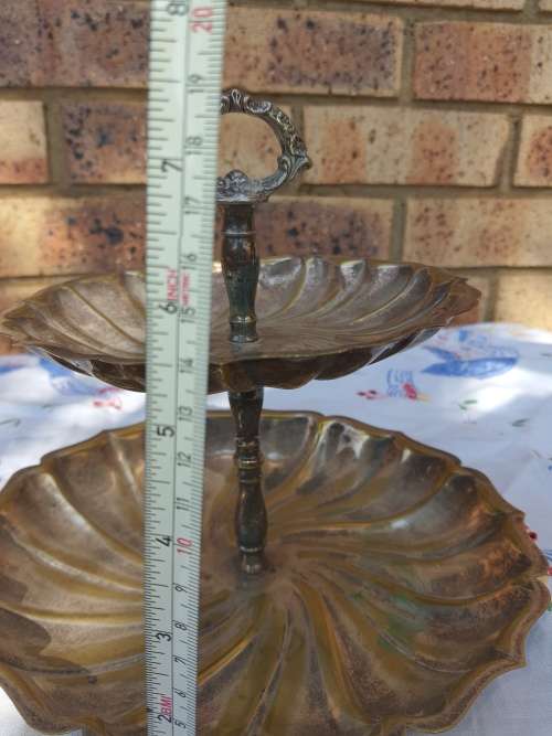 A VINTAGE SILVER PLATED 2 TIER SERVING TRAY SOLD AS IS