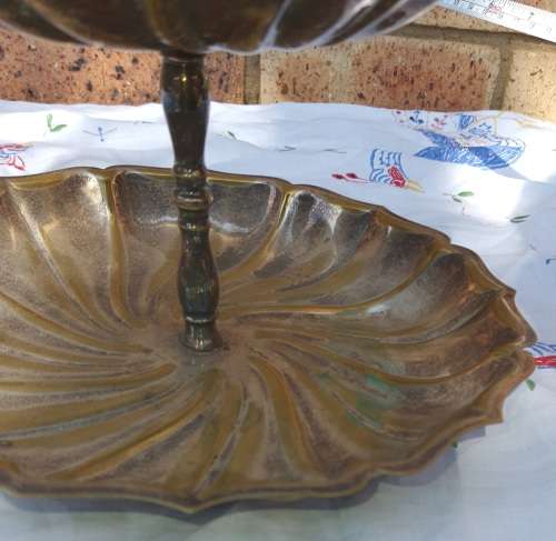 A VINTAGE SILVER PLATED 2 TIER SERVING TRAY SOLD AS IS