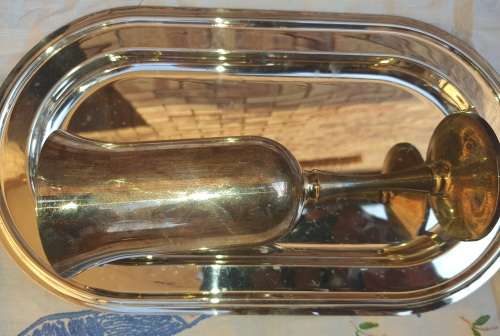 A JOBOT SILVER PLATED TRAY AND A WINE FLUTE SOLD AS IS