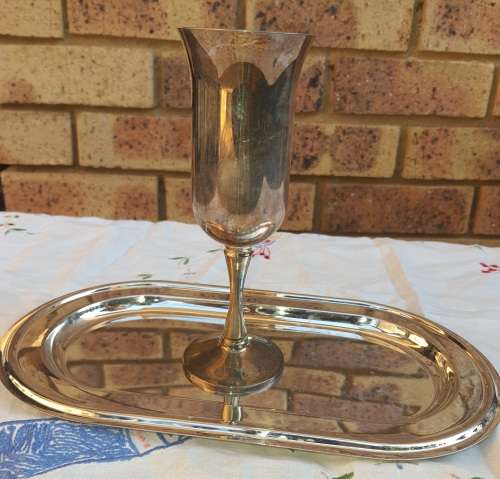 A JOBOT SILVER PLATED TRAY AND A WINE FLUTE SOLD AS IS