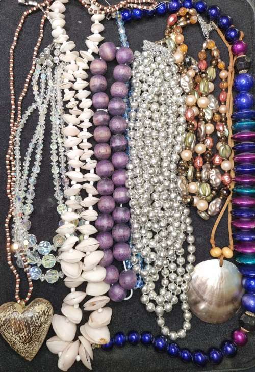 A VINTAGE COLLECTION JOBLOT OF BEADED COSTUME NECKLACES SOLD AS IS