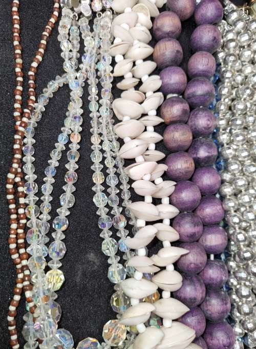 A VINTAGE COLLECTION JOBLOT OF BEADED COSTUME NECKLACES SOLD AS IS