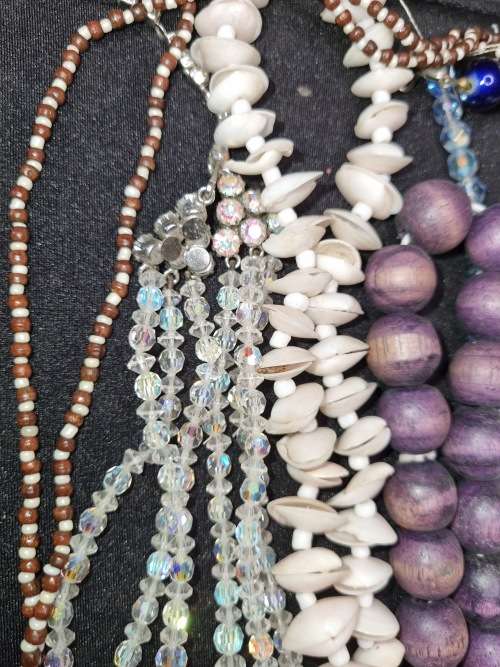 A VINTAGE COLLECTION JOBLOT OF BEADED COSTUME NECKLACES SOLD AS IS