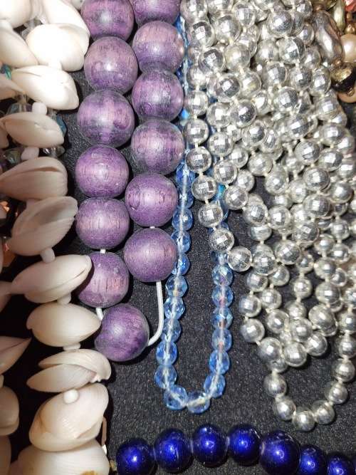 A VINTAGE COLLECTION JOBLOT OF BEADED COSTUME NECKLACES SOLD AS IS