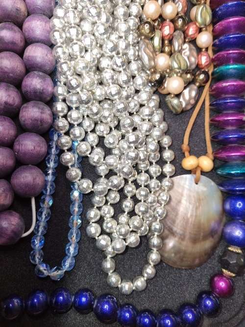 A VINTAGE COLLECTION JOBLOT OF BEADED COSTUME NECKLACES SOLD AS IS
