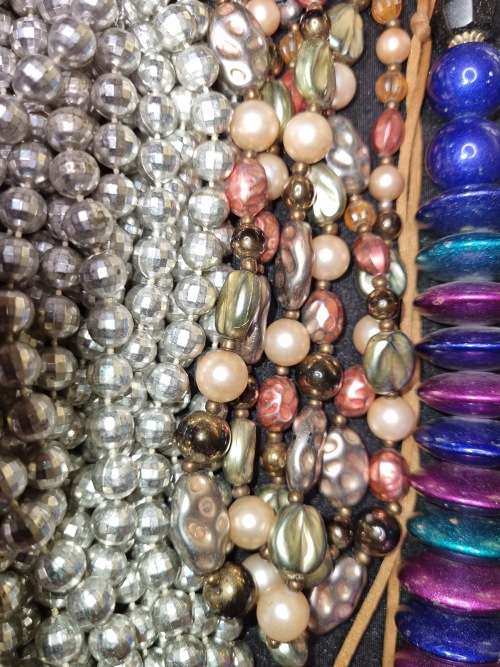 A VINTAGE COLLECTION JOBLOT OF BEADED COSTUME NECKLACES SOLD AS IS