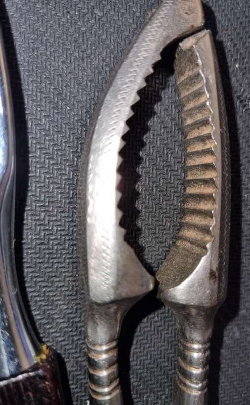 TWO VINTAGE STEEL NUT CRACKERS IN GOOD CONDITION SOLD AS IS