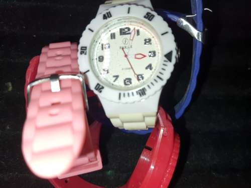A FANCY FARAH QUARTZ MULTI INTERCHANGABLE COLOURED BANDS SOLD AS IS NOT TESTED