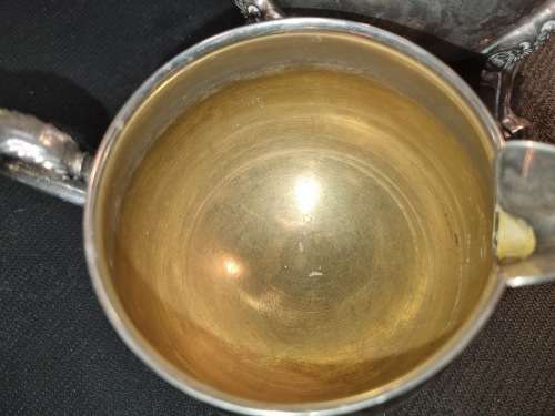 A VINTAGE SILVER-PLATED VICTORIAN STYLE TEA JUG, MILK AND SUGAR BOWL SET SOLD AS IS