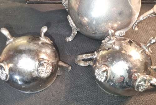 A VINTAGE SILVER-PLATED VICTORIAN STYLE TEA JUG, MILK AND SUGAR BOWL SET SOLD AS IS