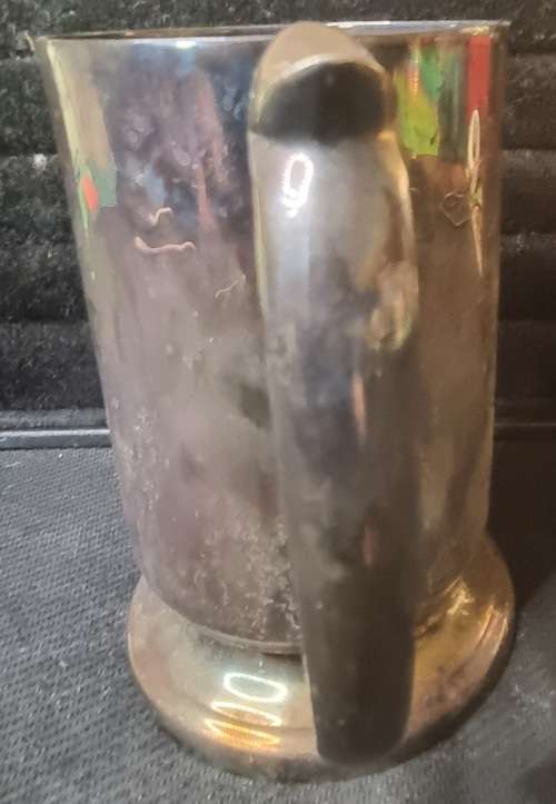 A SOLID VINTAGE SILVER PLATED BEER MUG ENGRAVED SEAN SOLD AS IS