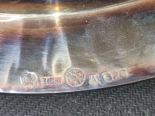 AN ANTIQUE SILVER-PLATED SOLID SERVING TRAY SOLD AS IS