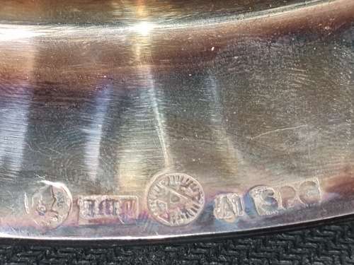 AN ANTIQUE SILVER-PLATED SOLID SERVING TRAY SOLD AS IS