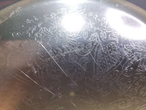 A ROUND STAINLESS STEEL MADE IN HONG KONG SERVING TRAY SOLD AS IS
