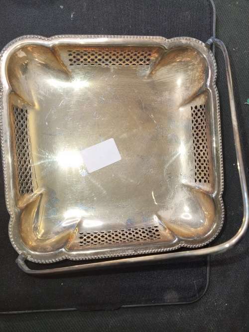 A VINTAGE SILVER PLATED SQUARE SHAPED SWEATS BASKET TRAY IN RELATIVE GOOD CONDITION SOLD AS IS