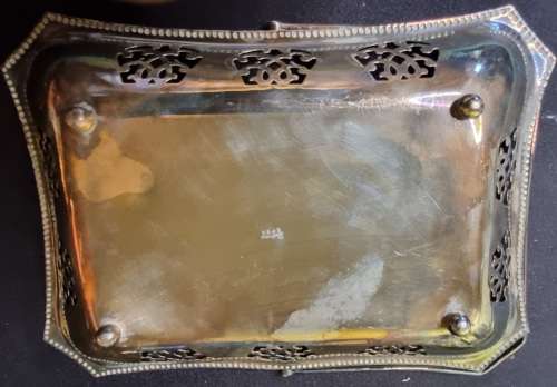 A VINTAGE RACTANGULAR SILVER PLATED SERVING BASKET TRAY SOLD AS IS