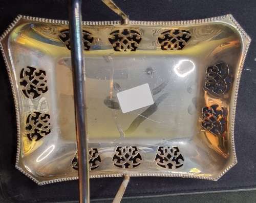 A VINTAGE RACTANGULAR SILVER PLATED SERVING BASKET TRAY SOLD AS IS