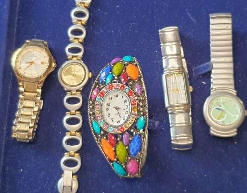A jab lot quartz woman`s wrist watches sold as is not tested