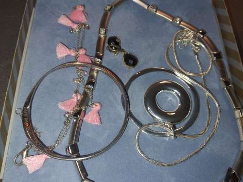 TWO SETS OF COSTUME SILVER PLATED NECKACE SETS SOLD AS IS